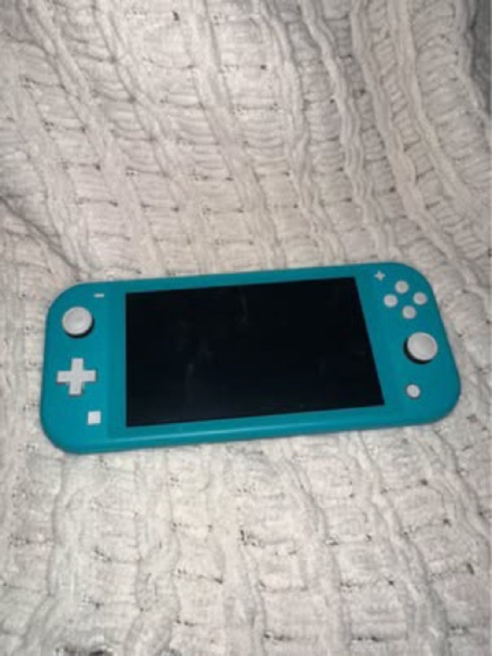 Turquoise Handheld Ninetendo Switch Lite - Portable Video Game System